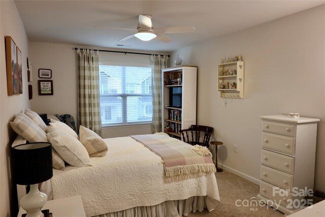 14 Malcolm Ct, Candler, NC 28715 - carpeted bedroom featuring visible vents, a ceiling fan, and baseboards