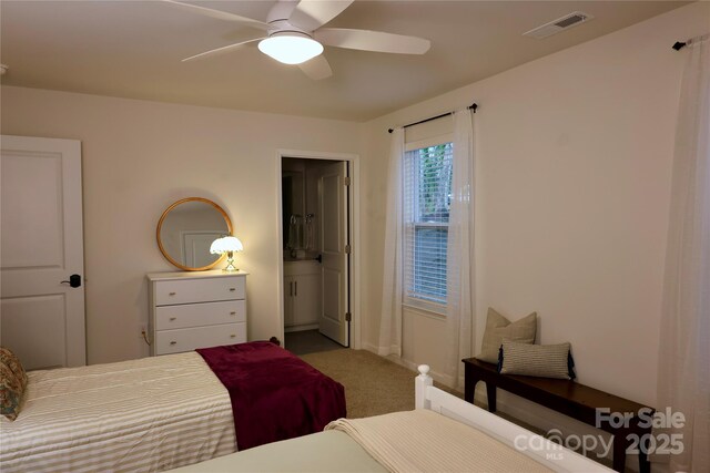 14 Malcolm Ct, Candler, NC 28715 - bedroom with a ceiling fan, carpet floors, baseboards, ensuite bath, and visible vents