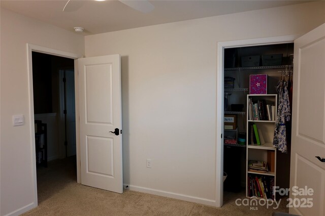 14 Malcolm Ct, Candler, NC 28715 - unfurnished bedroom with baseboards, carpet floors, and a closet