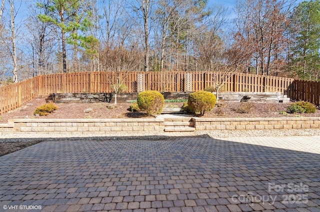 view of patio / terrace featuring fence private yard