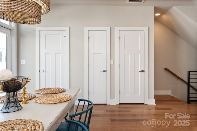 dining area featuring dark hardwood / wood-style floors