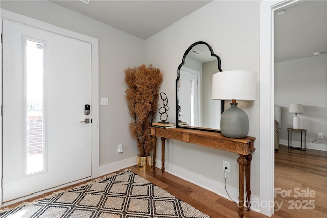 entrance foyer with hardwood / wood-style flooring