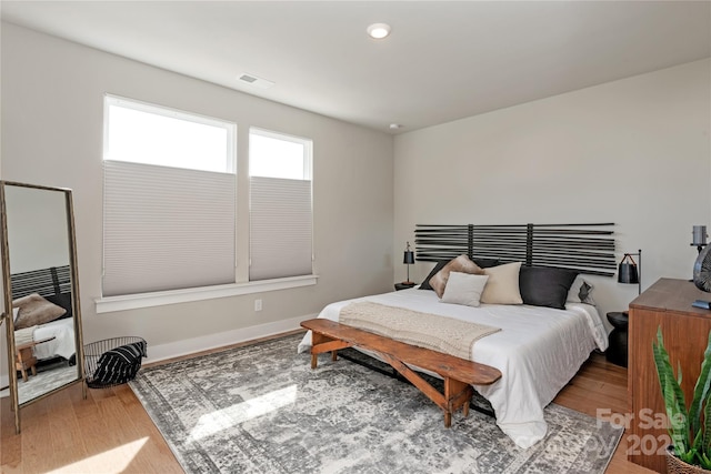 bedroom featuring hardwood / wood-style floors