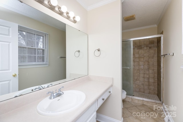 bathroom featuring an enclosed shower, vanity, tile patterned flooring, and crown molding