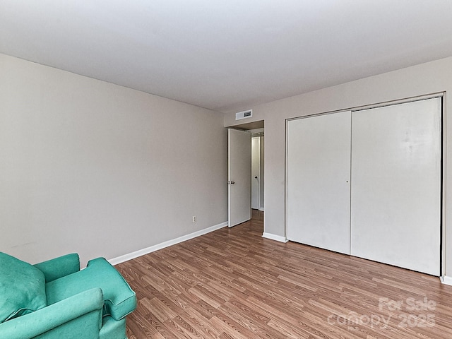 unfurnished room featuring light hardwood / wood-style flooring