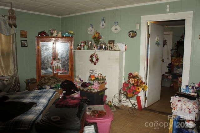 bedroom with ornamental molding