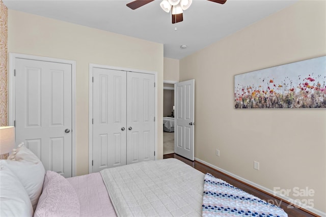 bedroom with ceiling fan, baseboards, a closet, and wood finished floors