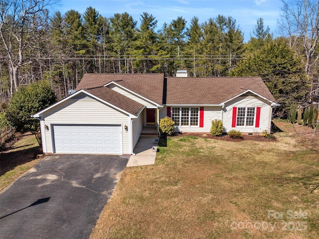 ranch-style home featuring a front yard, an attached garage, driveway, and roof with shingles