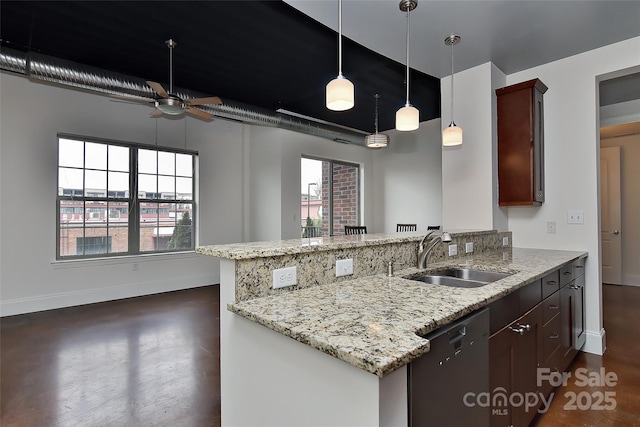 kitchen featuring light stone counters, sink, kitchen peninsula, and black dishwasher