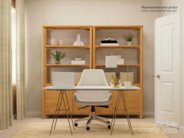 carpeted office space featuring baseboards