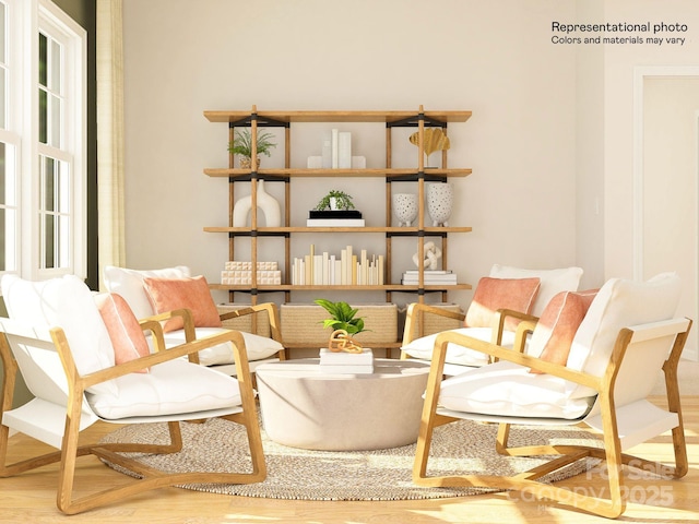 sitting room featuring wood finished floors