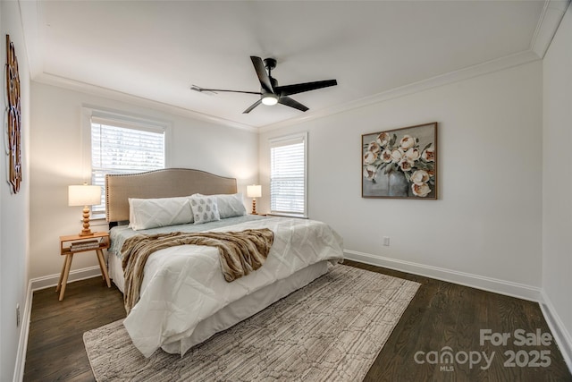 bedroom with dark wood-style floors, multiple windows, baseboards, and crown molding