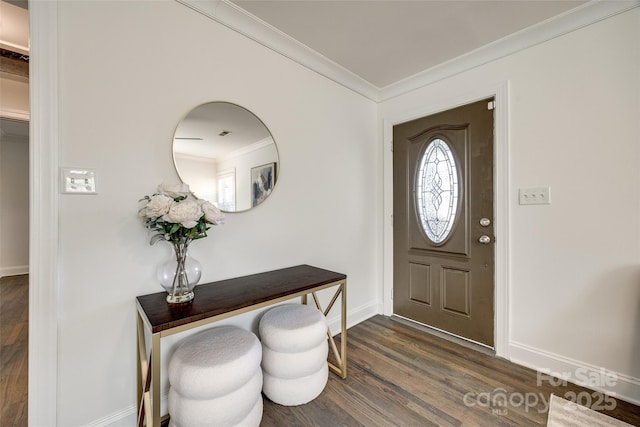 entryway with ornamental molding, baseboards, and dark wood-style floors