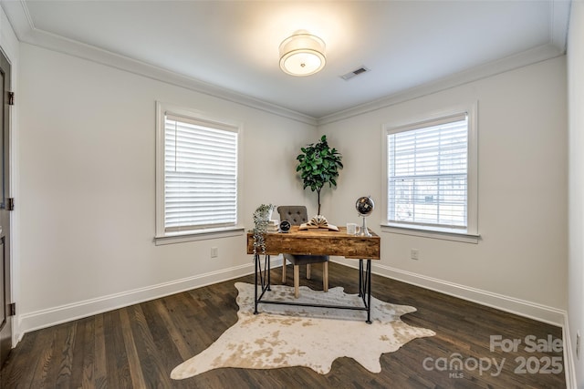 office space with dark wood-style flooring, crown molding, and baseboards