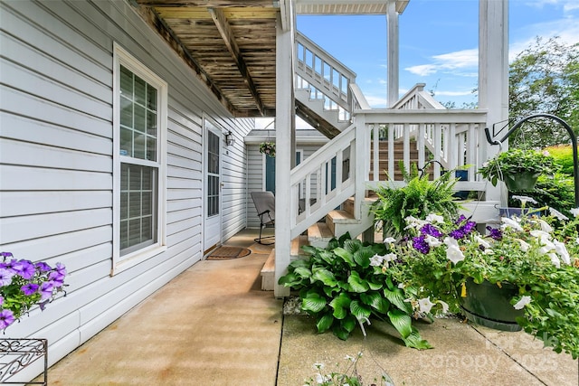 view of side of home with a patio