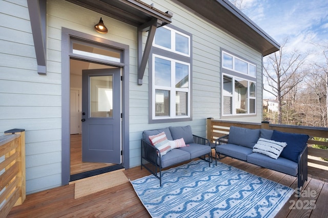 deck with an outdoor hangout area