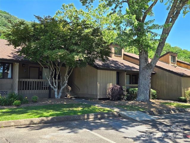 view of front of home featuring covered porch