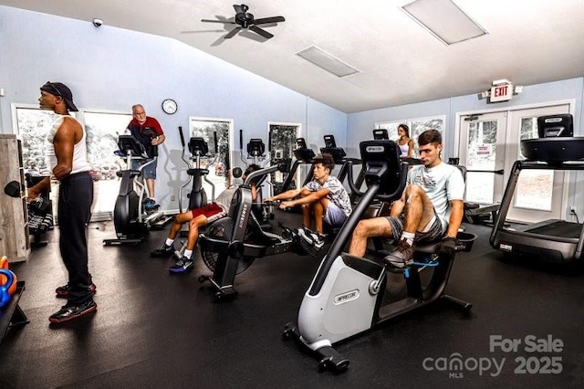 exercise room with vaulted ceiling and ceiling fan