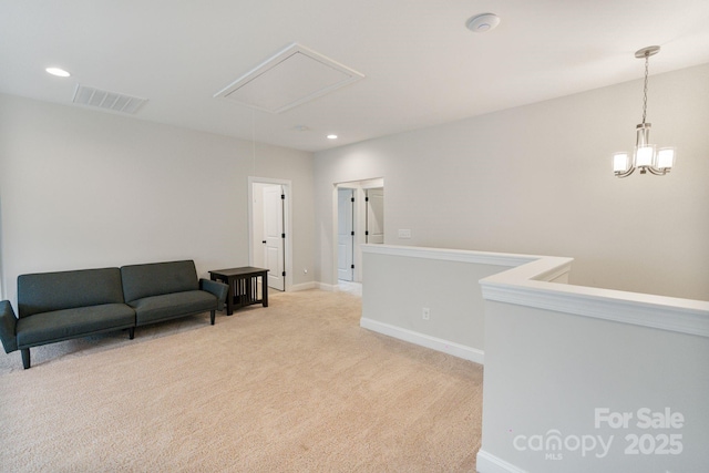 living area with light colored carpet