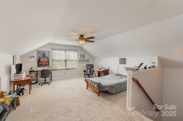 bedroom with lofted ceiling, carpet, a ceiling fan, and baseboards