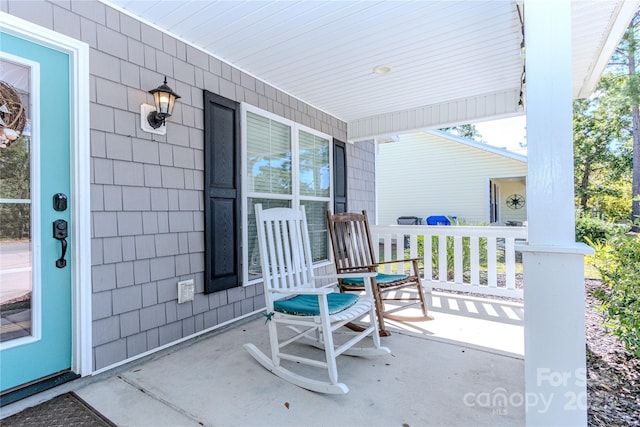 view of patio / terrace with a porch