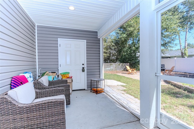 property entrance with a patio