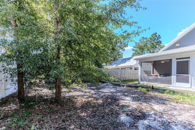 view of yard with a sunroom