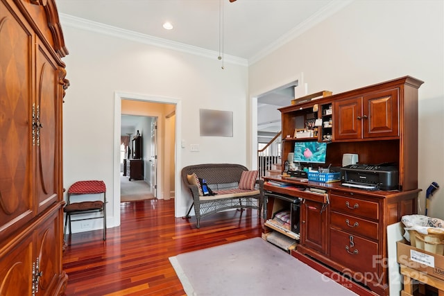 office area with dark wood-style floors, baseboards, and ornamental molding