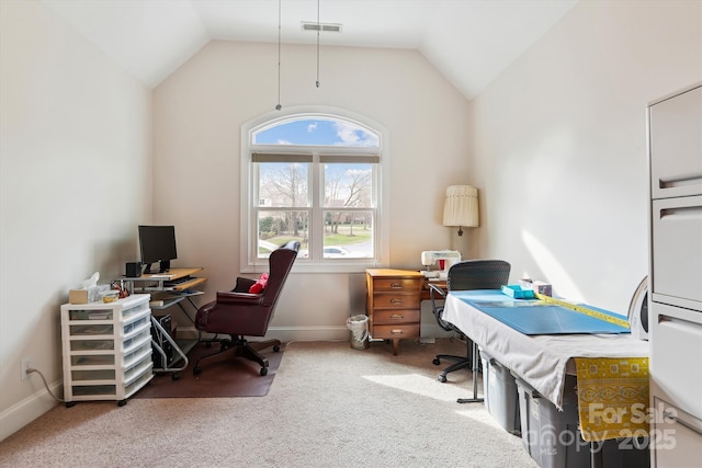 home office with lofted ceiling, baseboards, visible vents, and carpet flooring