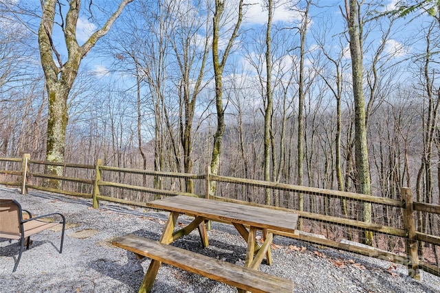 wooden deck with a patio area