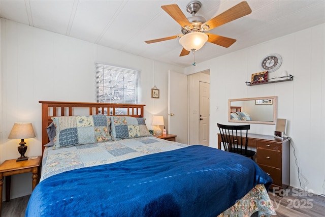 bedroom featuring hardwood / wood-style floors and ceiling fan