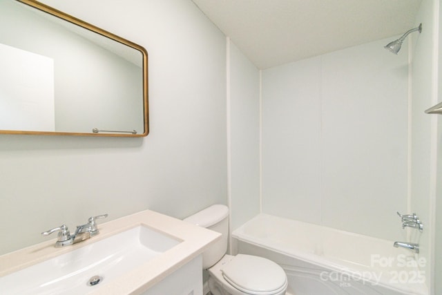 full bathroom with vanity, toilet, and washtub / shower combination