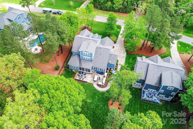 birds eye view of property with a residential view