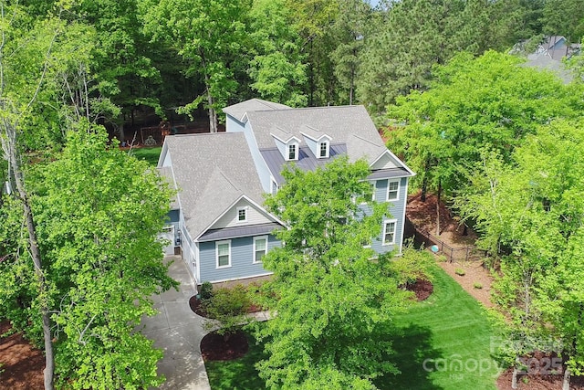 bird's eye view featuring a view of trees