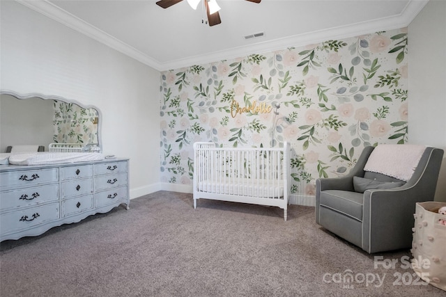 bedroom featuring a nursery area, crown molding, carpet floors, baseboards, and visible vents
