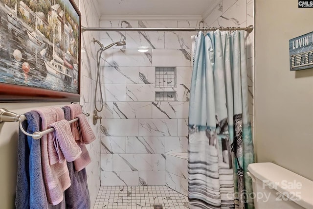 full bathroom with ornamental molding, a stall shower, and toilet