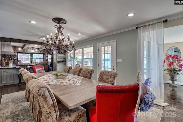 dining area featuring baseboards, recessed lighting, dark wood finished floors, and crown molding