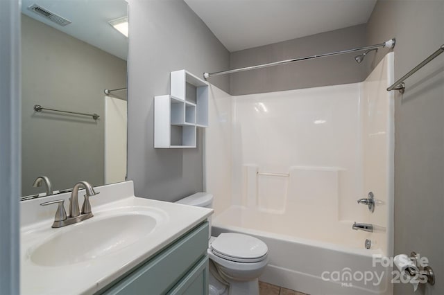 full bathroom with toilet, vanity, and shower / tub combination