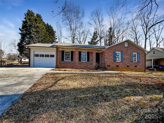 single story home with a garage