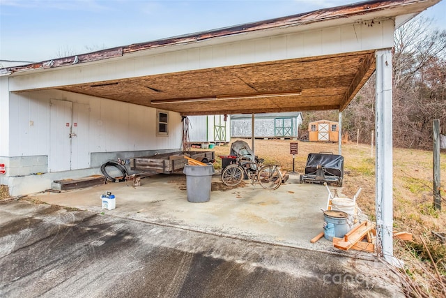 view of patio with a shed