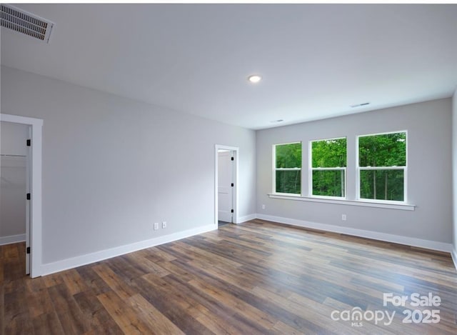 114 Glencoe Ln Unit 106, Mooresville, NC 28117 - unfurnished room featuring wood finished floors and recessed lighting