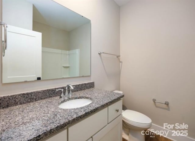 114 Glencoe Ln Unit 106, Mooresville, NC 28117 - bathroom with toilet and vanity