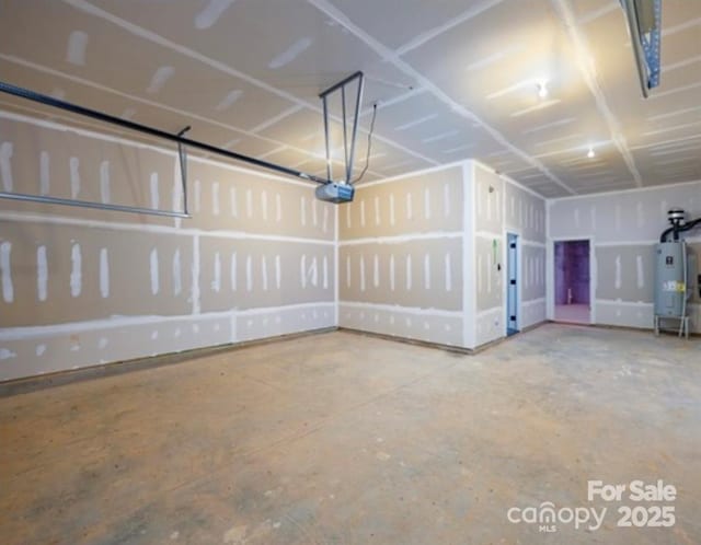 114 Glencoe Ln Unit 106, Mooresville, NC 28117 - garage featuring electric water heater and a garage door opener
