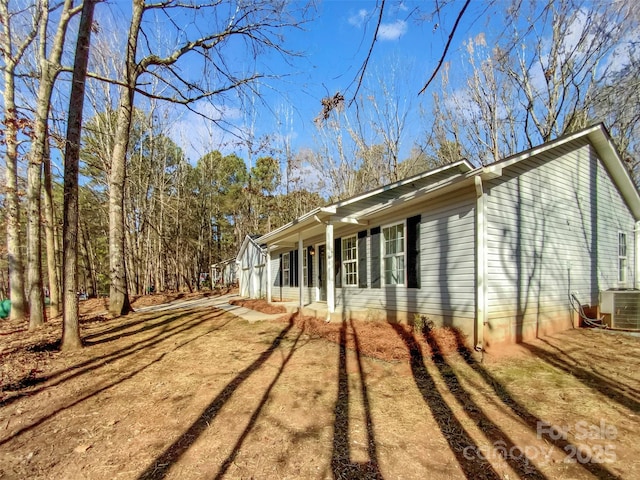 view of home's exterior with central AC