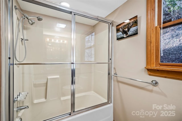 bathroom featuring enclosed tub / shower combo