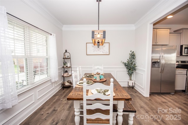 137 Tenth Green Ct, Statesville, NC 28677 - dining area with crown molding, dark wood-type flooring, a decorative wall, and wainscoting