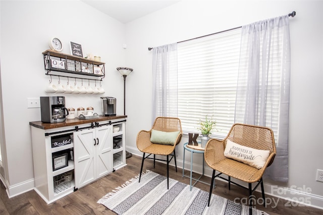 137 Tenth Green Ct, Statesville, NC 28677 - living area featuring a dry bar, wood finished floors, and baseboards