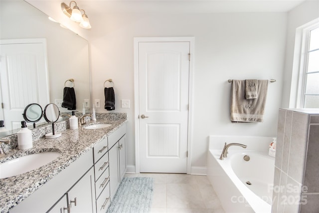 137 Tenth Green Ct, Statesville, NC 28677 - full bath featuring double vanity, plenty of natural light, a garden tub, and tile patterned floors