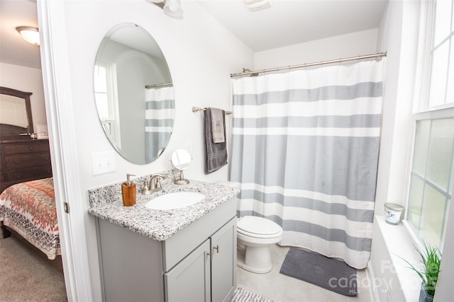 137 Tenth Green Ct, Statesville, NC 28677 - ensuite bathroom featuring vanity, toilet, a shower with curtain, and tile patterned flooring