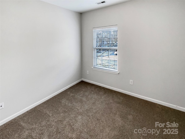 view of carpeted spare room